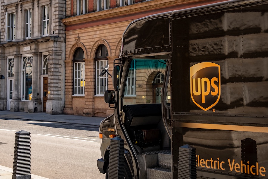 UPS delivery truck parked on the side of a city street